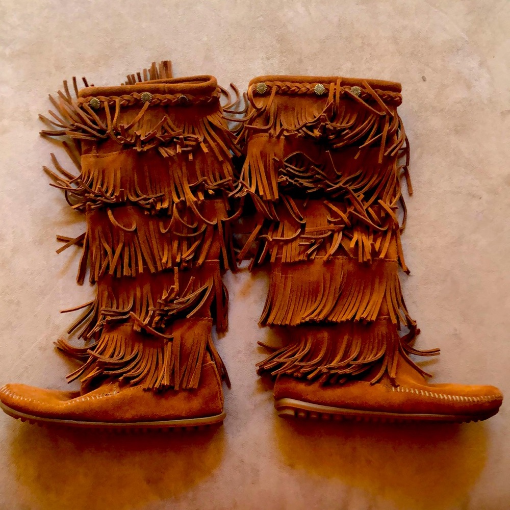 Moccasin style boots.